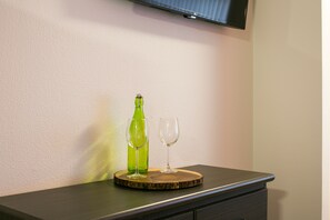 32-inch flat-screen TV with cable channels, TV