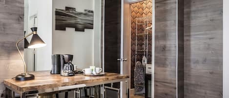 Room, 1 King Bed | Down comforters, desk, blackout drapes, iron/ironing board