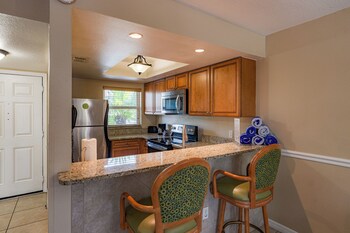 Villa, 2 Bedrooms | Private kitchen | Full-size fridge, microwave, oven, stovetop at FantasyWorld Resort