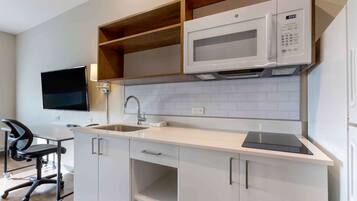 Premium bedding, desk, blackout drapes, iron/ironing board