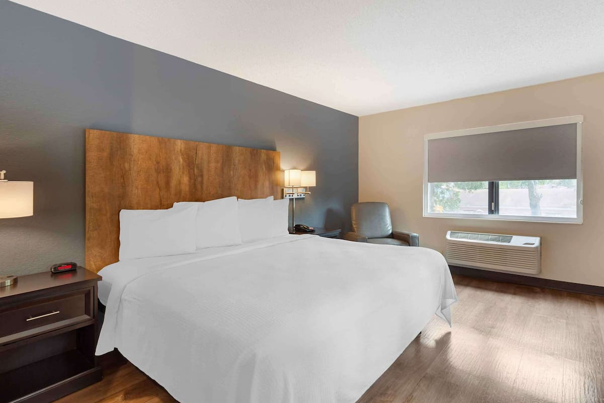 Premium bedding, desk, blackout curtains, iron/ironing board