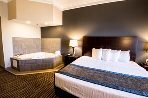 Suite, 1 King Bed, Non Smoking, Jetted Tub | Premium bedding, in-room safe, blackout drapes, iron/ironing board