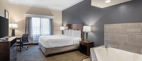Suite, 1 cama King size, para no fumadores, hidromasaje | Ropa de cama de alta calidad y caja de seguridad en la habitación