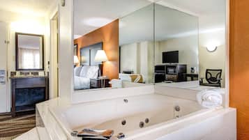 Room, 1 King Bed, Non Smoking, Jetted Tub | In-room safe, desk, blackout drapes, iron/ironing board