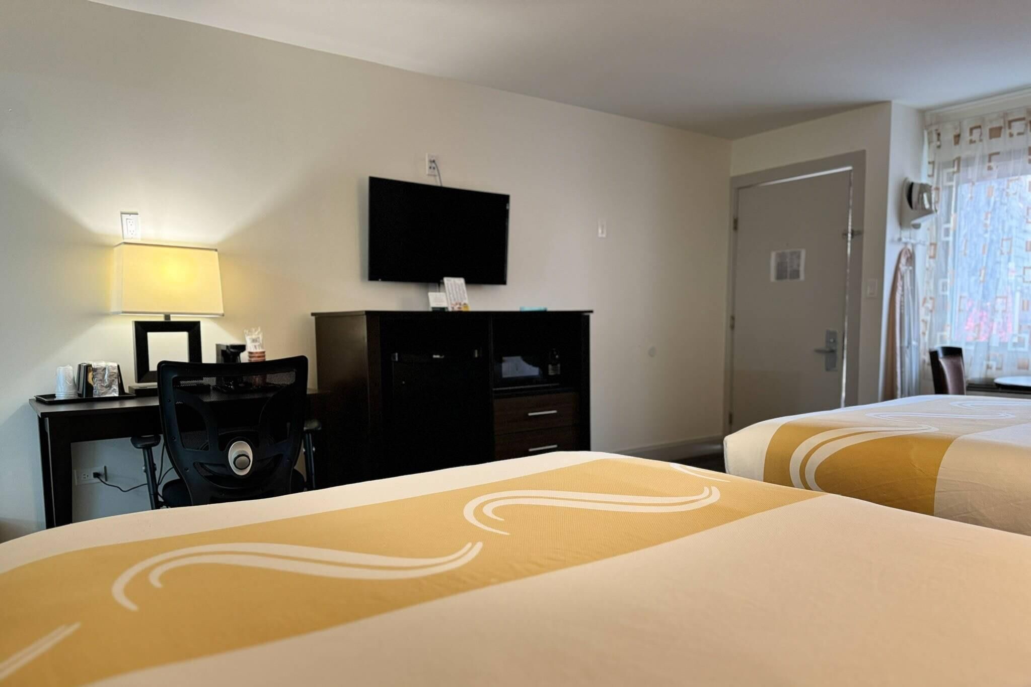 Premium Room, 2 Queen Beds, Non Smoking, Fireplace | In-room safe, desk, blackout drapes, iron/ironing board