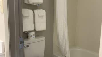 Combined shower/bathtub, deep-soaking bathtub, hair dryer, towels