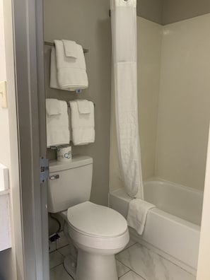 Combined shower/tub, deep soaking tub, hair dryer, towels