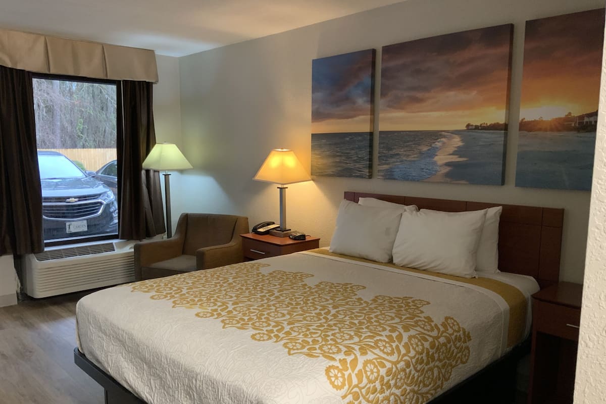 Individually decorated, desk, laptop workspace, iron/ironing board