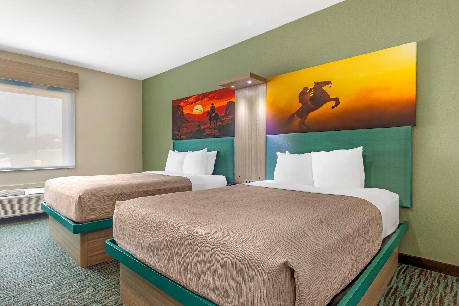 Hypo-allergenic bedding, desk, laptop workspace, blackout drapes