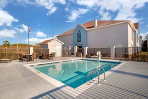 Seasonal outdoor pool, open 9 AM to 9 PM, pool umbrellas, sun loungers
