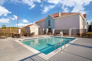Seasonal outdoor pool, open 9 AM to 9 PM, pool umbrellas, sun loungers