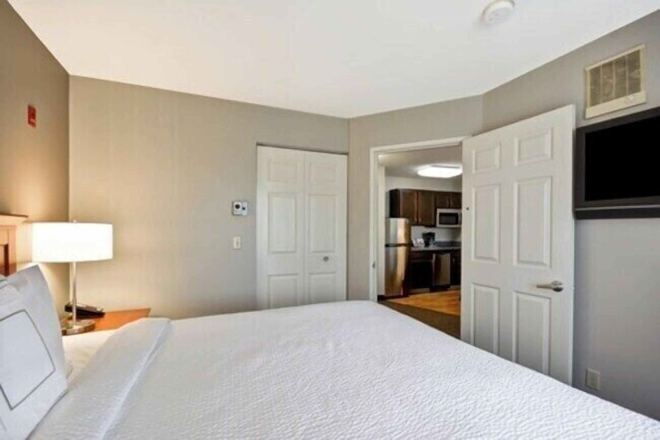 Suite, 1 Bedroom | Desk, blackout drapes, iron/ironing board, free cribs/infant beds