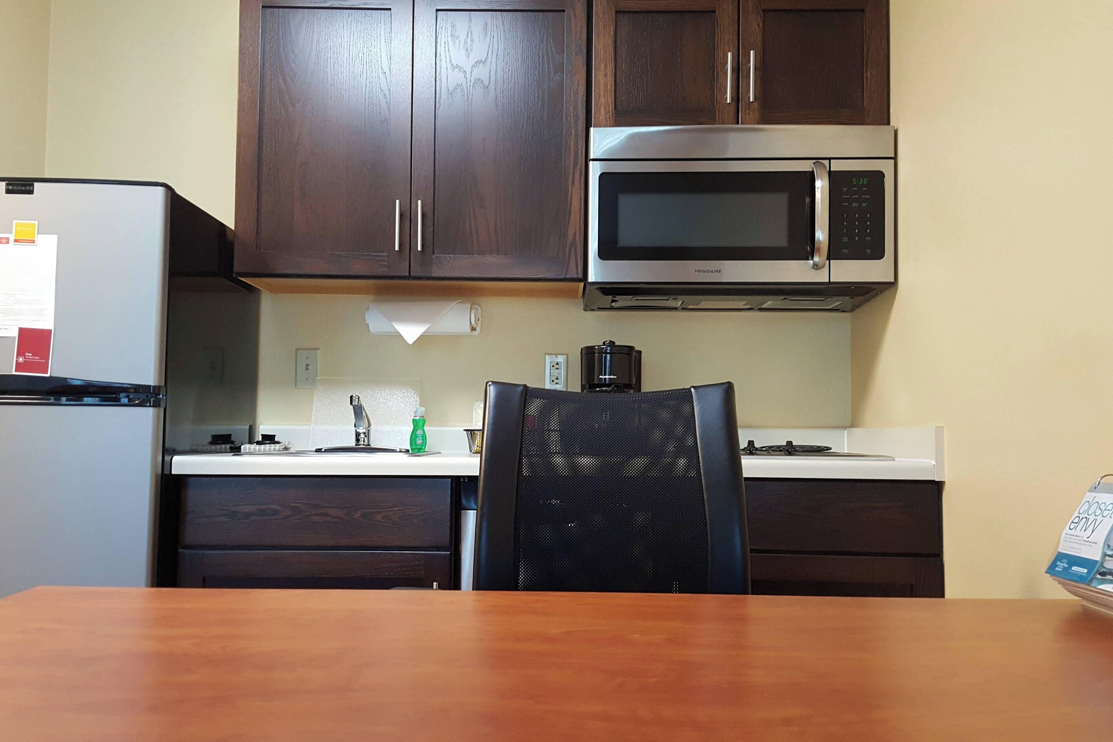 studio, 1 queen bed with sofa bed | private kitchen | full-sized fridge, microwave, stovetop, dishwasher