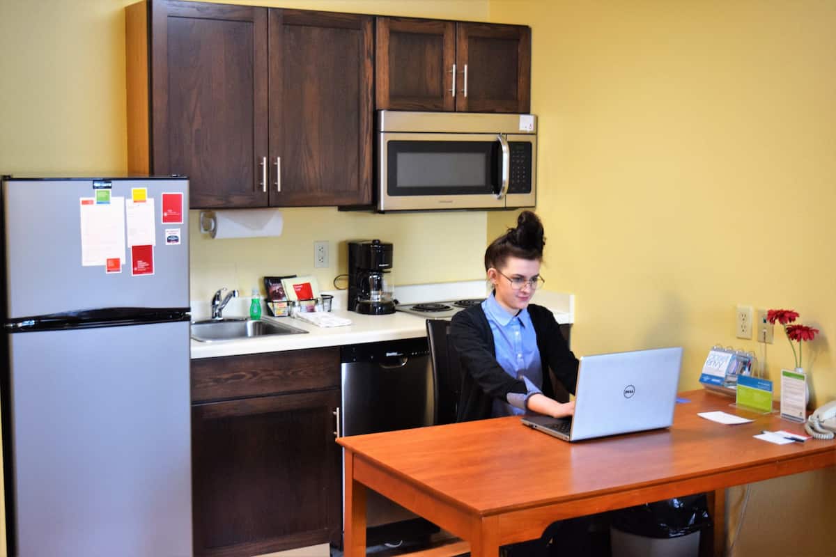 full-sized fridge, microwave, stovetop, dishwasher