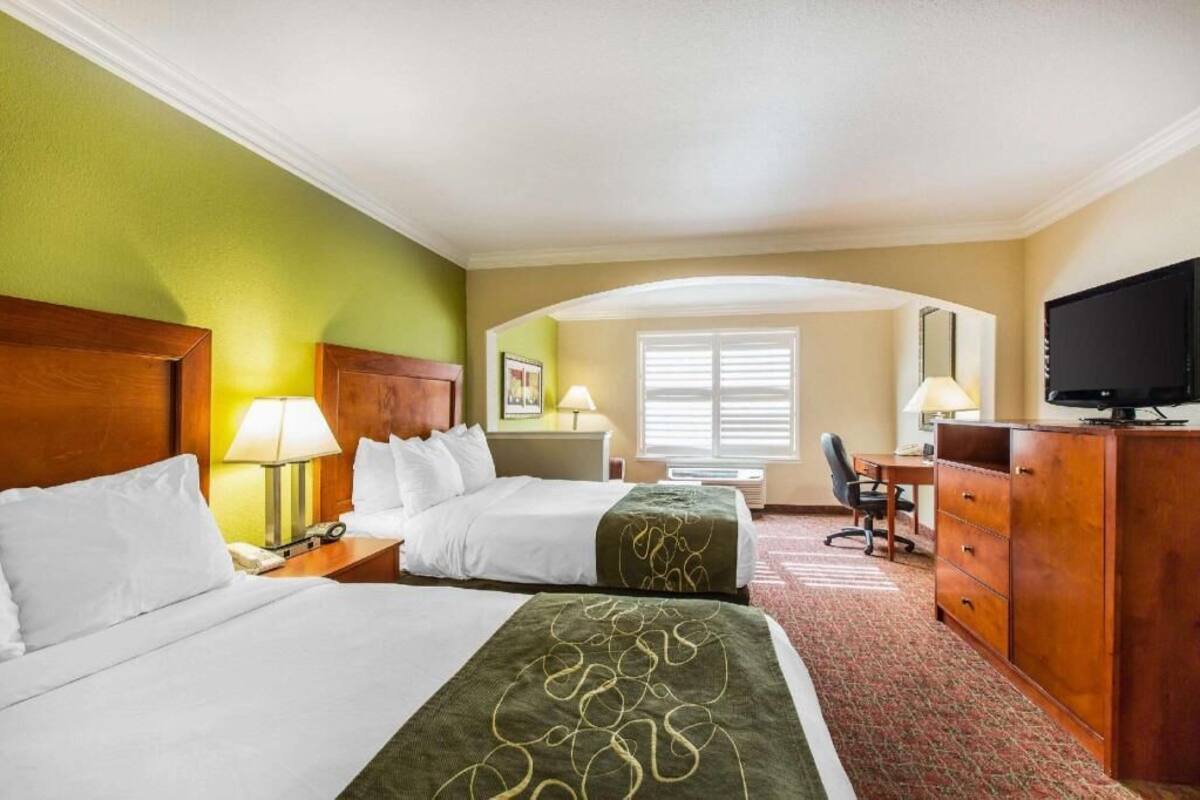 Premium bedding, pillowtop beds, desk, laptop workspace
