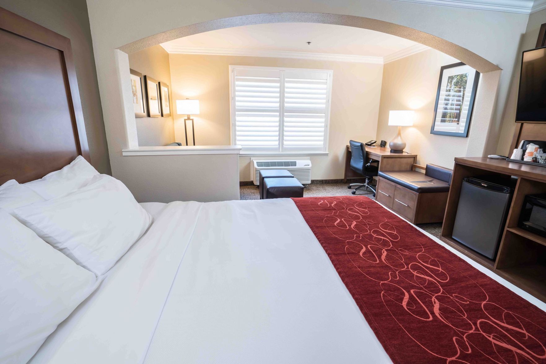 Premium bedding, pillowtop beds, desk, laptop workspace