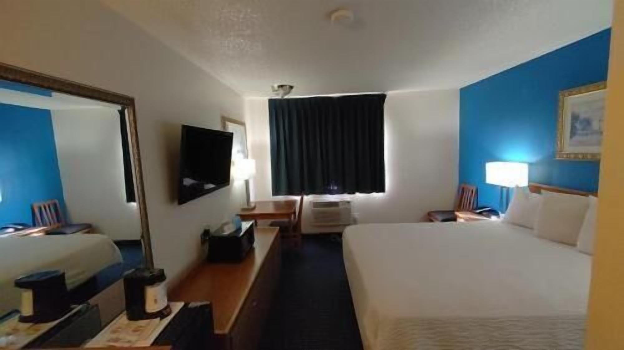 Desk, blackout drapes, iron/ironing board, free WiFi