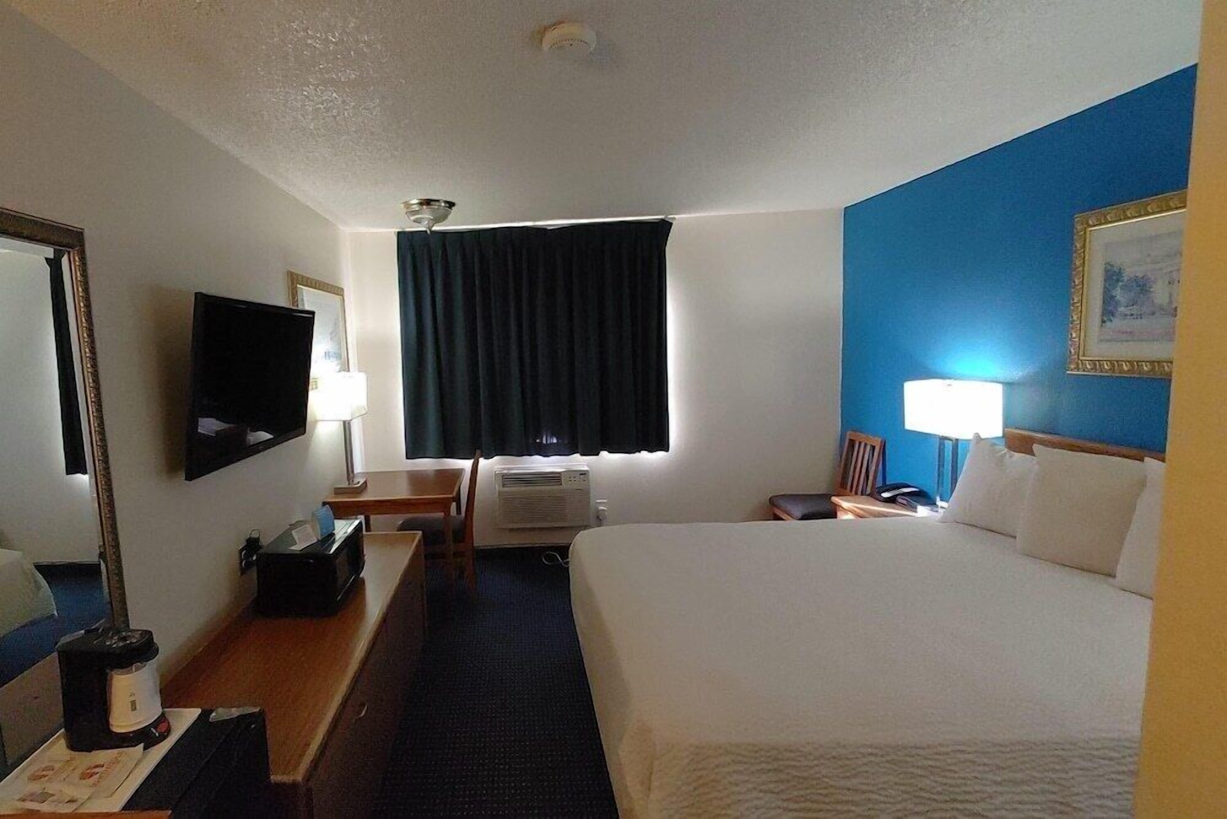 Desk, blackout drapes, iron/ironing board, free WiFi