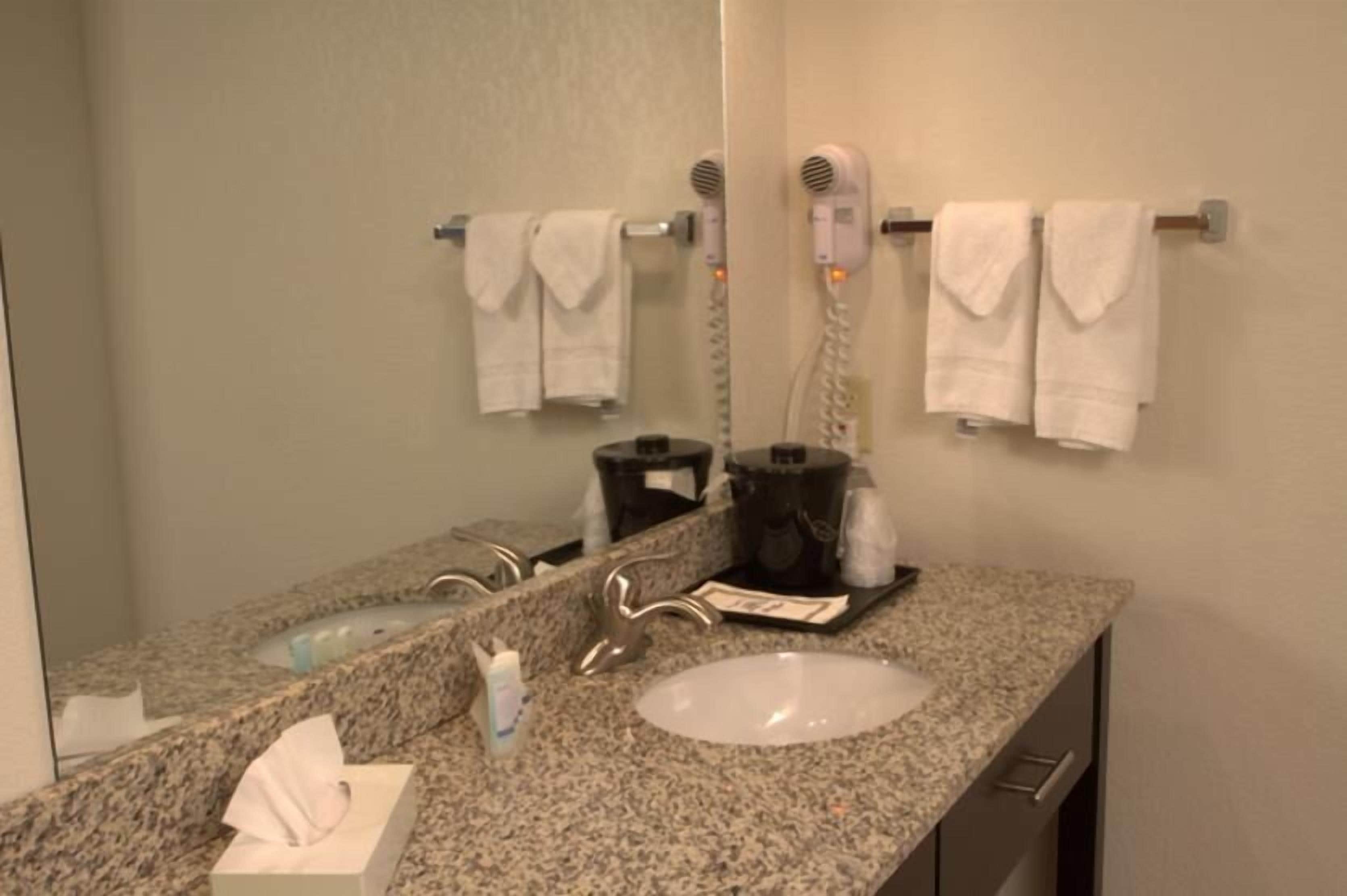 shower, eco-friendly toiletries, hair dryer, towels