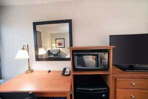 Hypo-allergenic bedding, desk, laptop workspace, blackout curtains