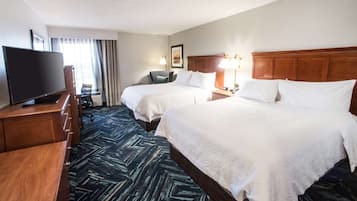 Hypo-allergenic bedding, desk, laptop workspace, blackout curtains