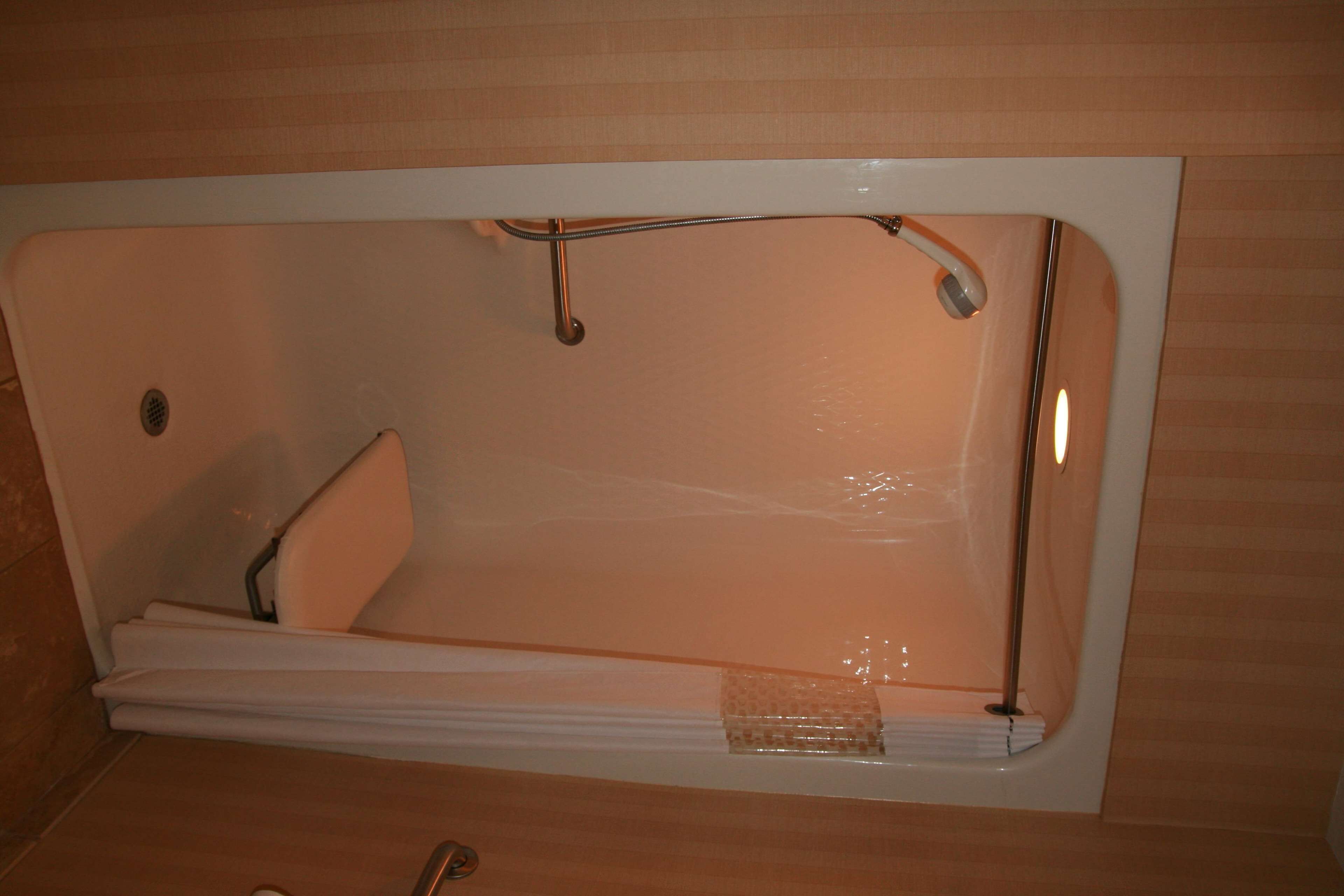 combined shower/bathtub, free toiletries, hair dryer, towels