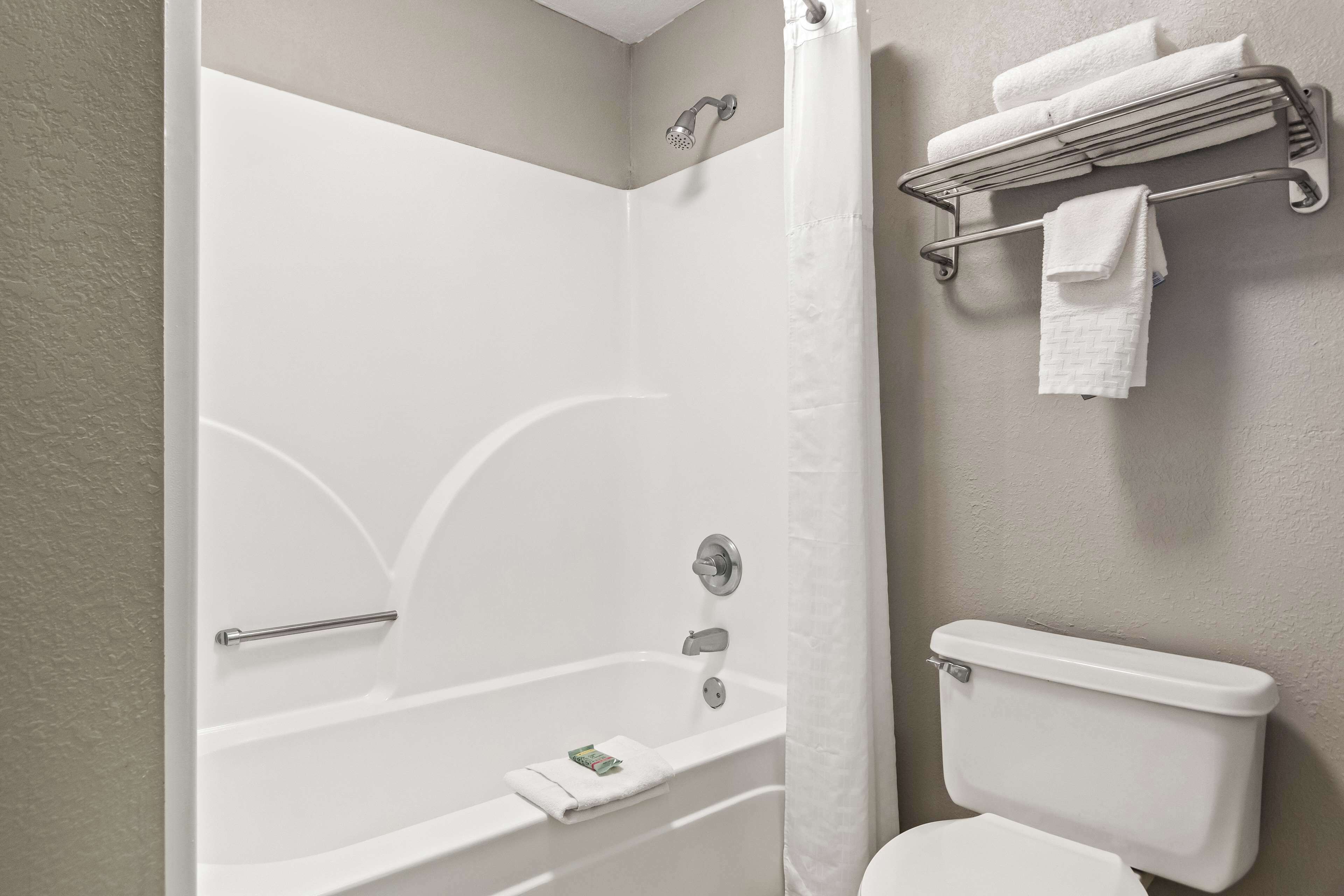 standard room, 2 queen beds, non smoking, refrigerator & microwave | bathroom | free toiletries, hair dryer, towels, soap