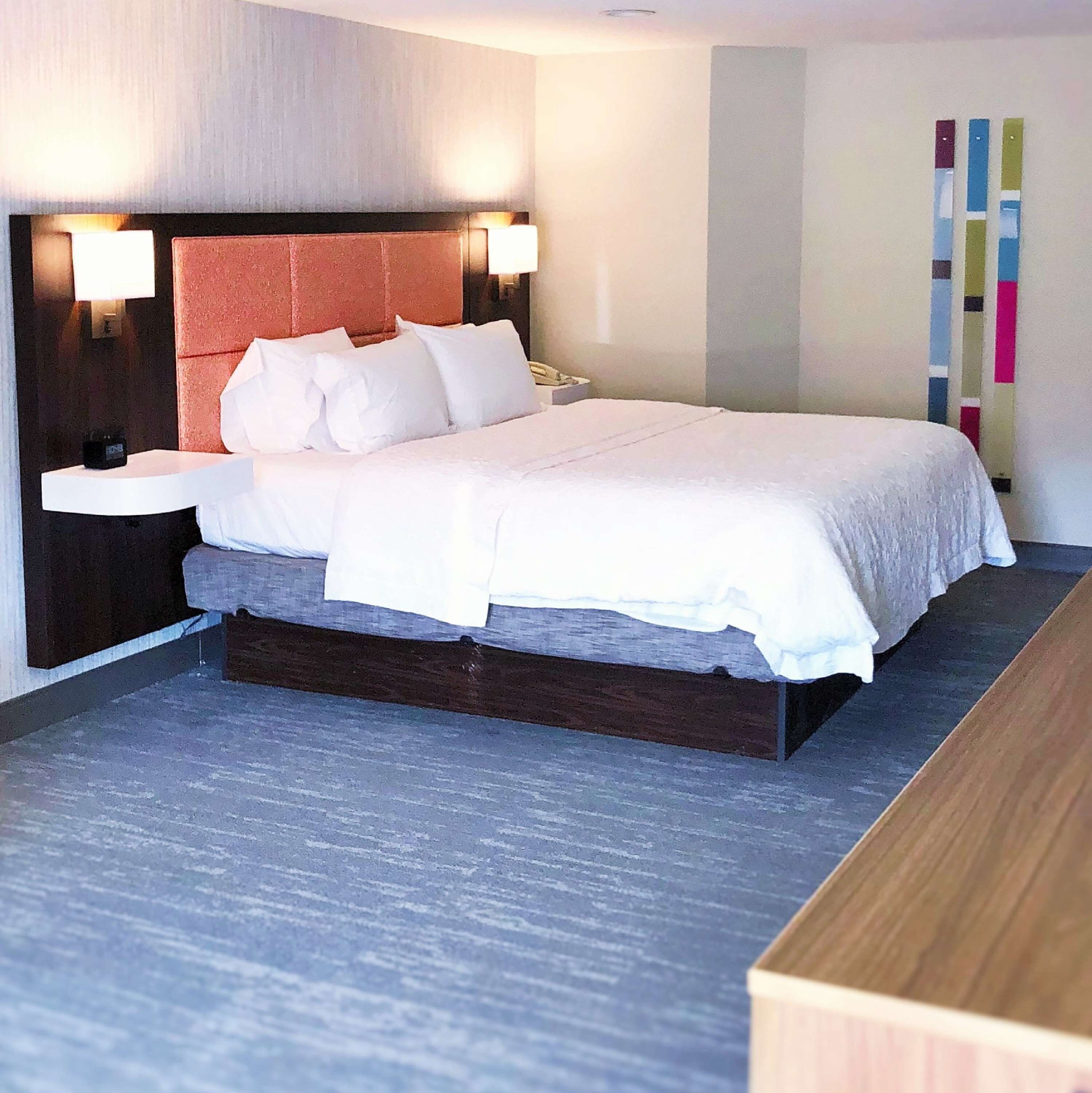 suite, 1 king bed, non smoking | in-room safe, iron/ironing board, free cots/infant beds, rollaway beds