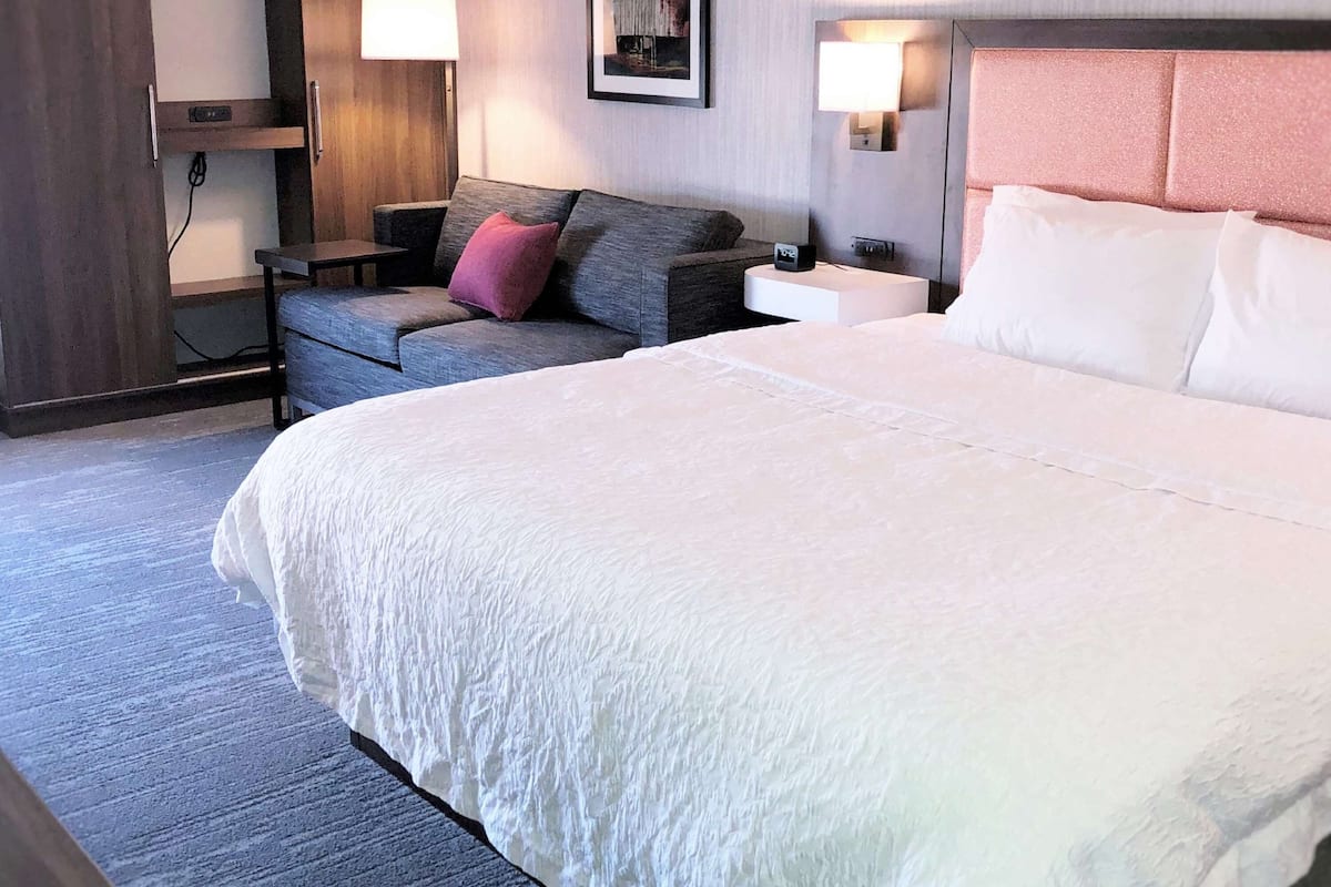 room, 1 king bed with sofa bed, non smoking (study) | in-room safe, iron/ironing board, free cots/infant beds, rollaway beds