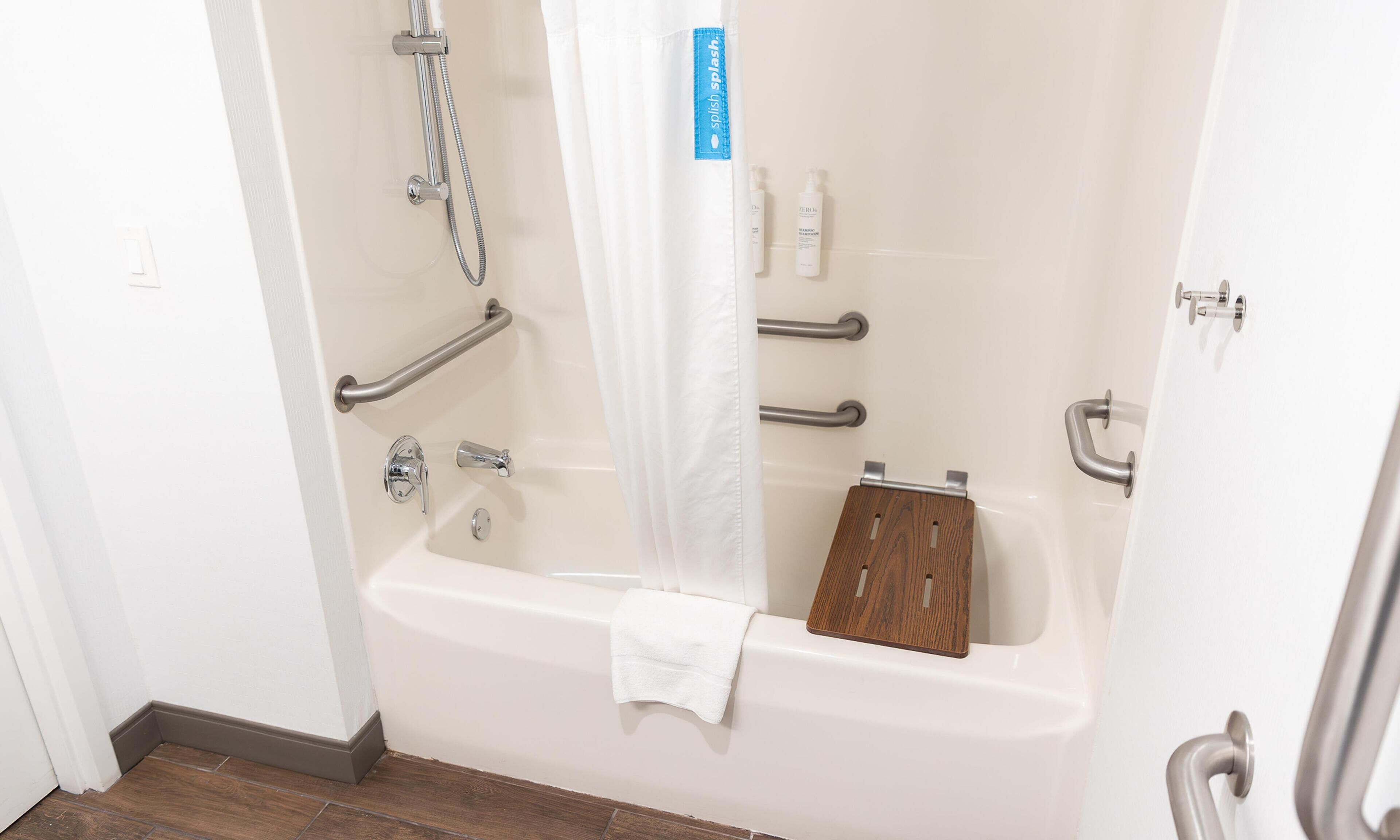 Room, 1 King Bed, Accessible, Bathtub (Mobility & Hearing) | Bathroom | Combined shower/tub, hydromassage showerhead, hair dryer, bathrobes