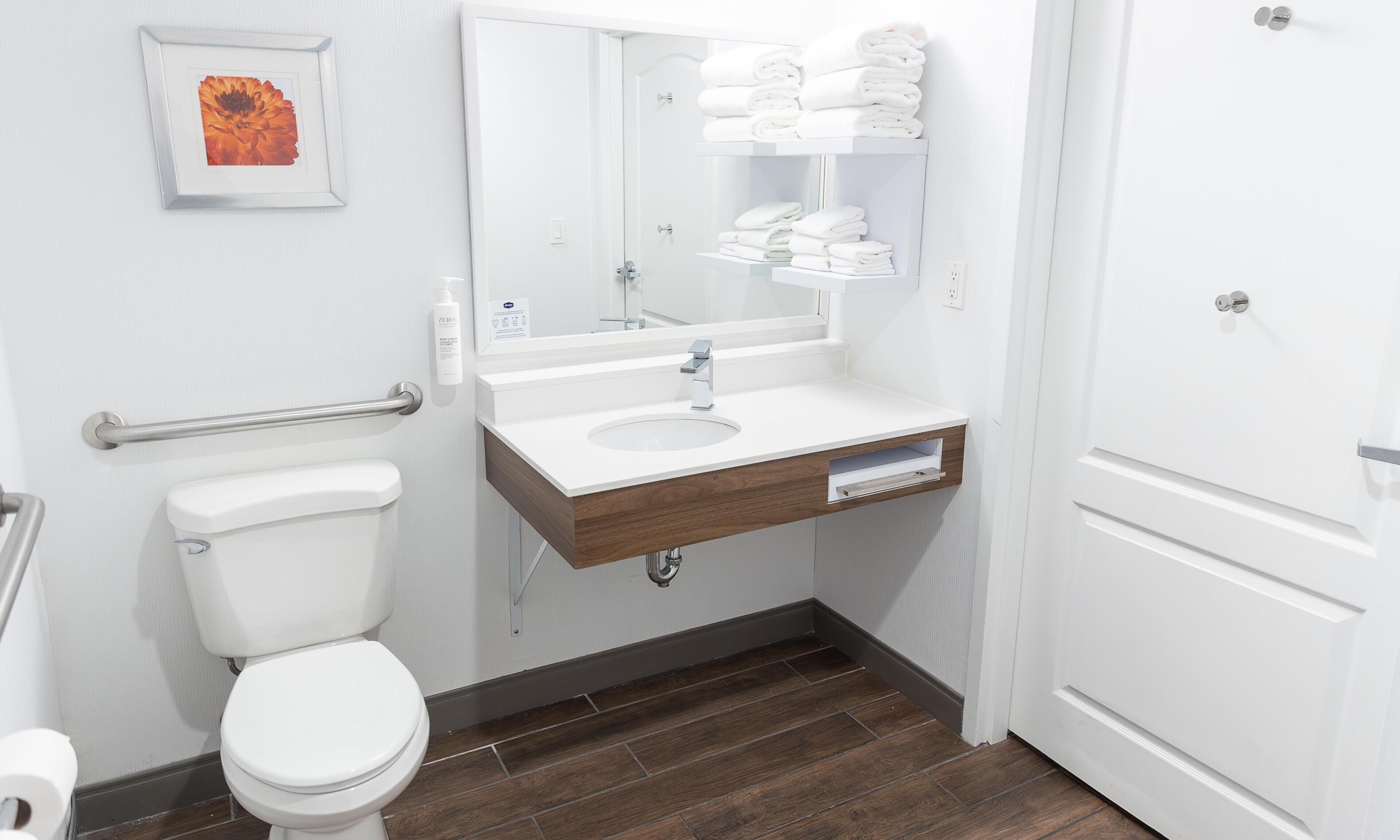 Combined shower/tub, hydromassage showerhead, hair dryer, bathrobes