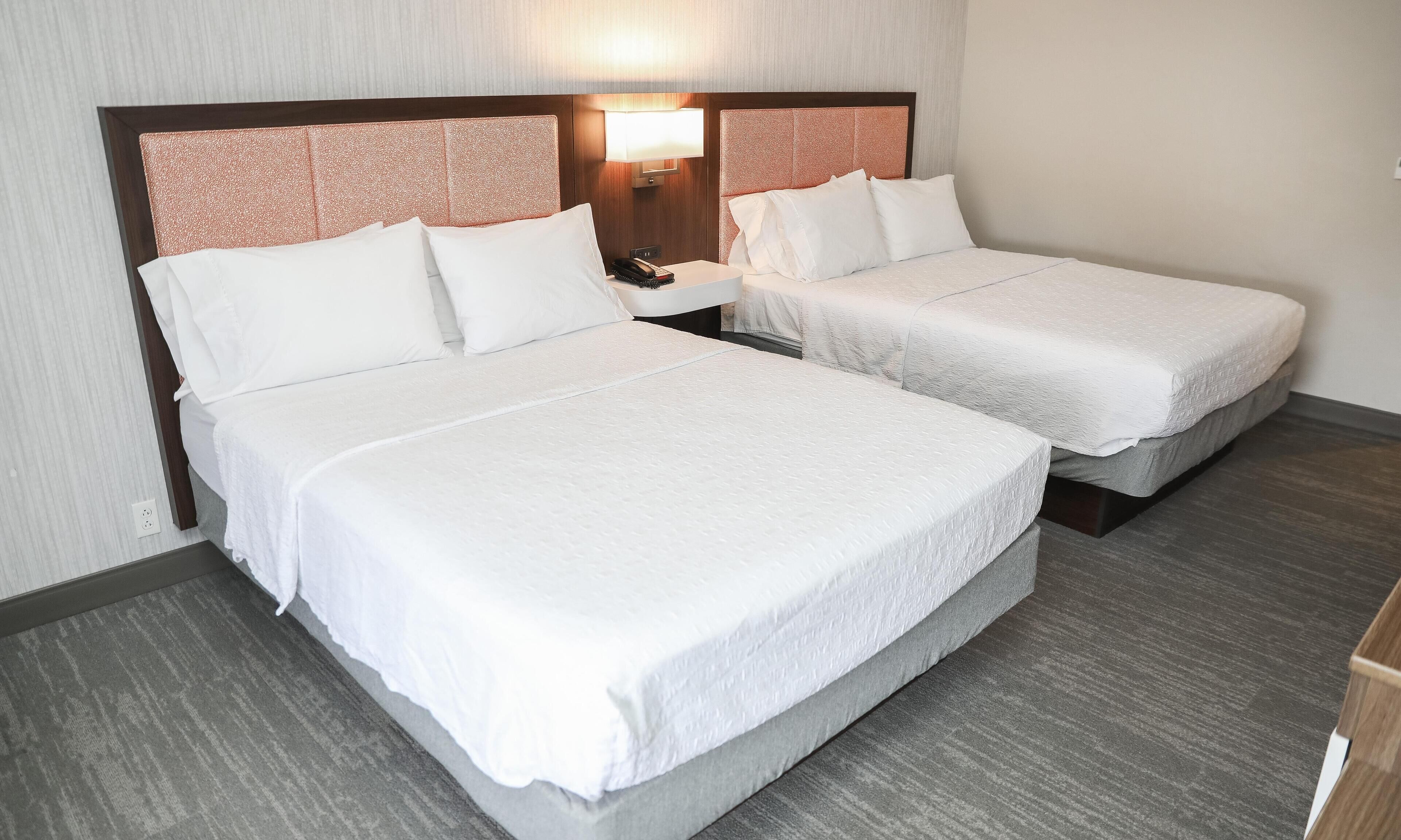 Room, 2 Queen Beds, Non Smoking | In-room safe, iron/ironing board, free cribs/infant beds, rollaway beds