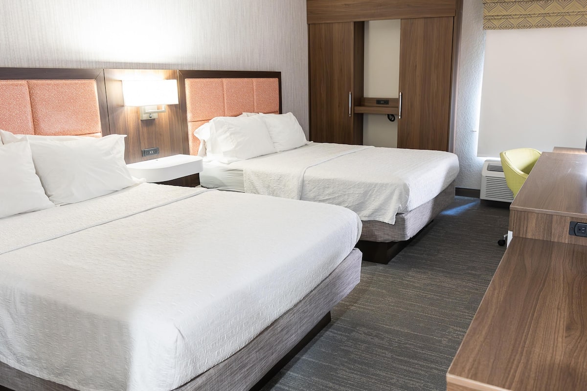 Room, 2 Queen Beds, Non Smoking | In-room safe, iron/ironing board, free cribs/infant beds, rollaway beds