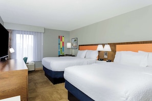 Premium bedding, down comforters, pillowtop beds, in-room safe