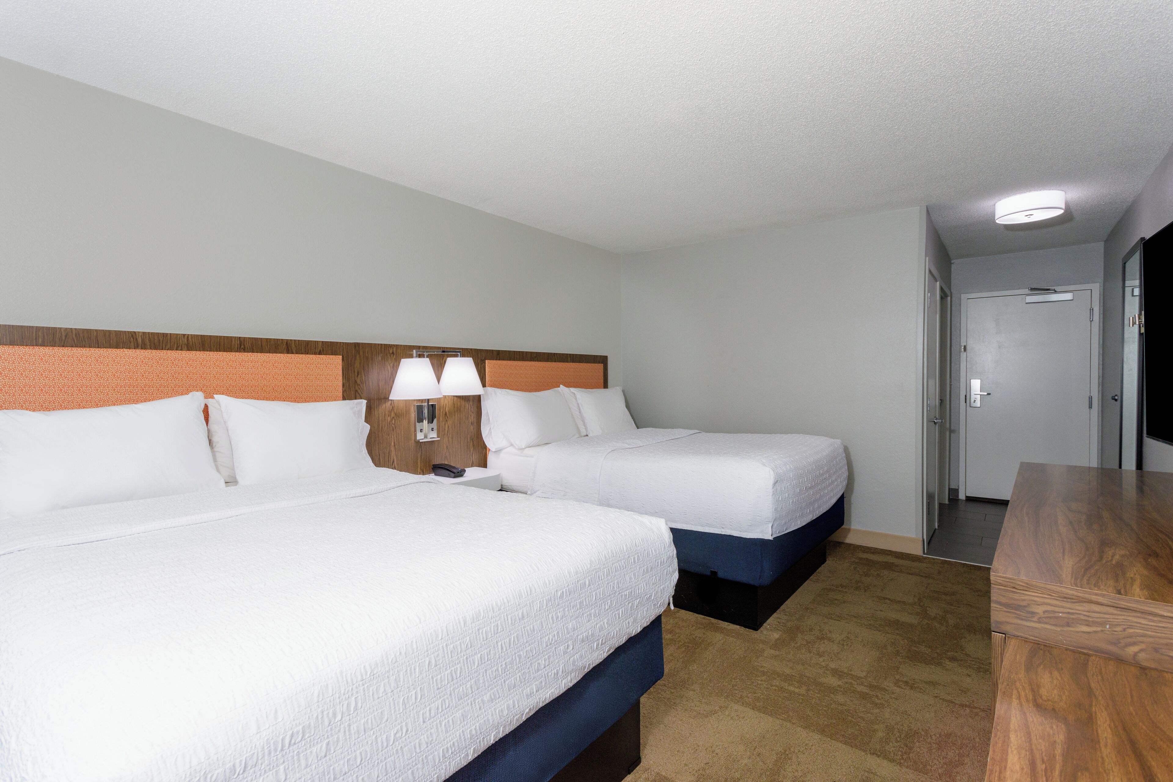 premium bedding, down duvets, pillow-top beds, in-room safe