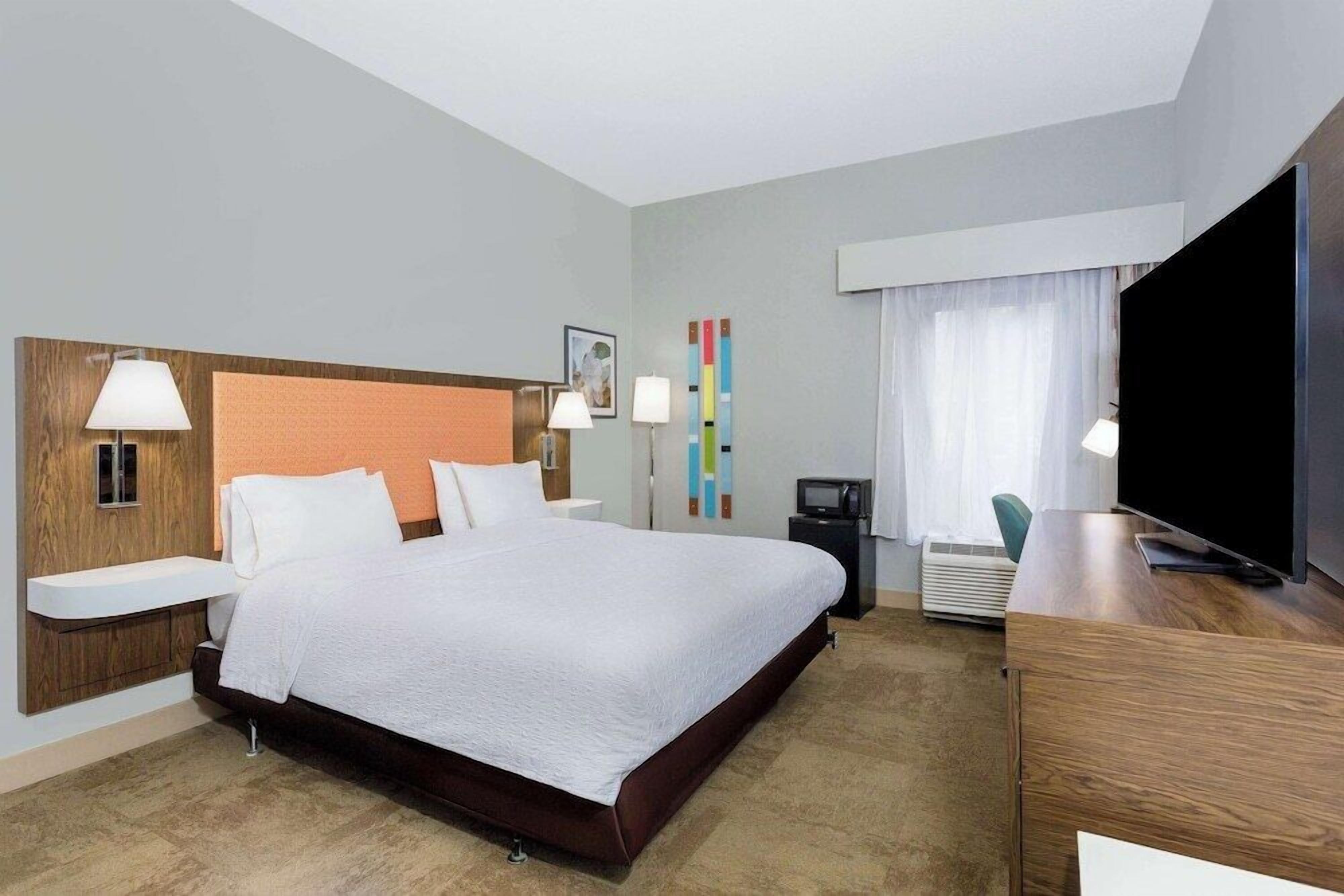 Premium bedding, down comforters, pillowtop beds, in-room safe