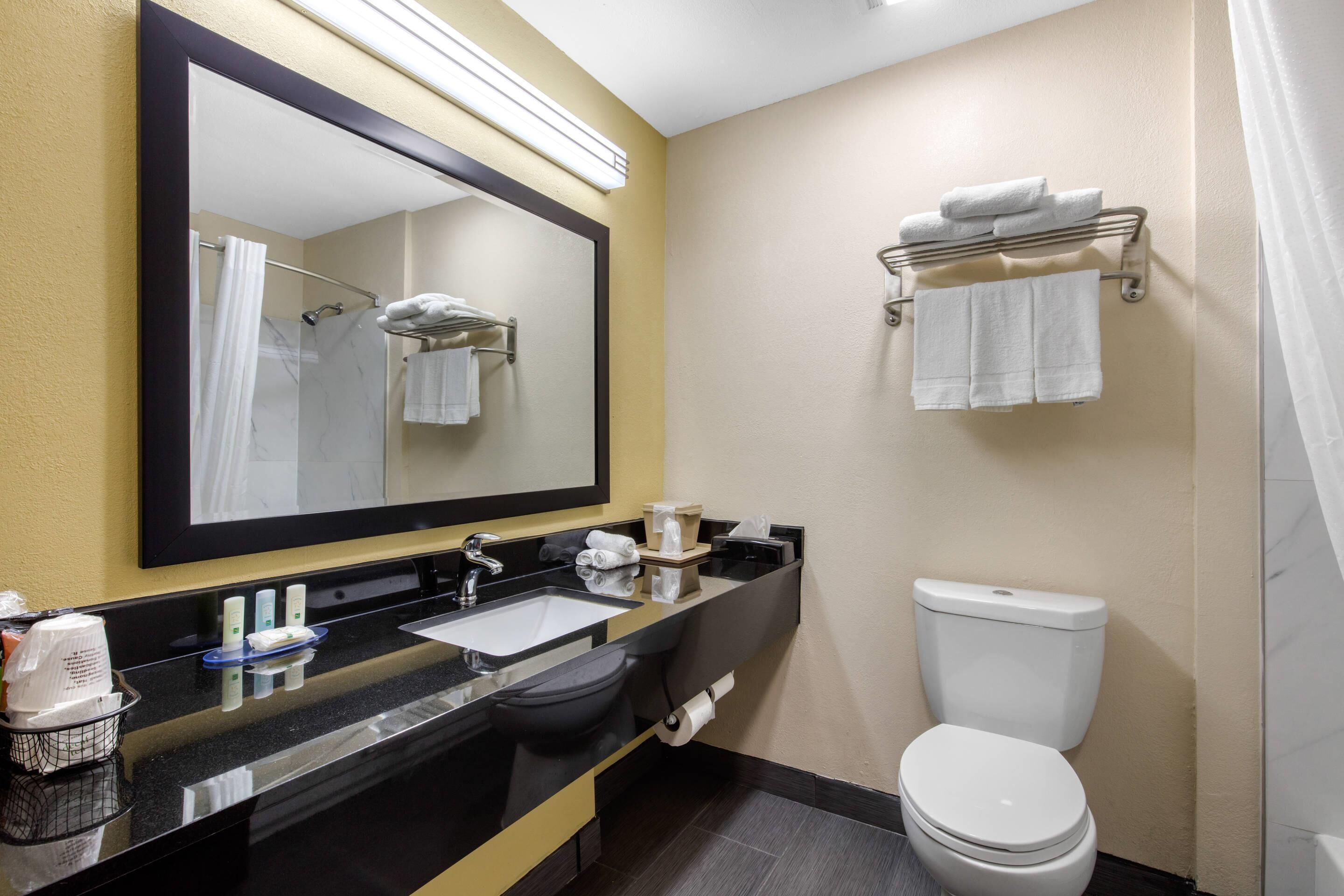 Premium bedding, desk, blackout drapes, soundproofing
