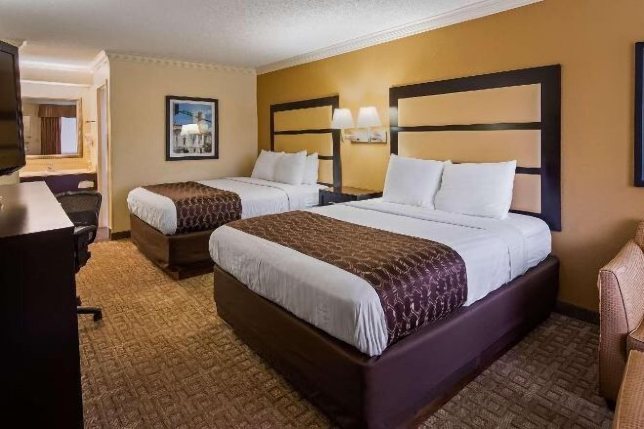 Premium bedding, down comforters, pillowtop beds, in-room safe