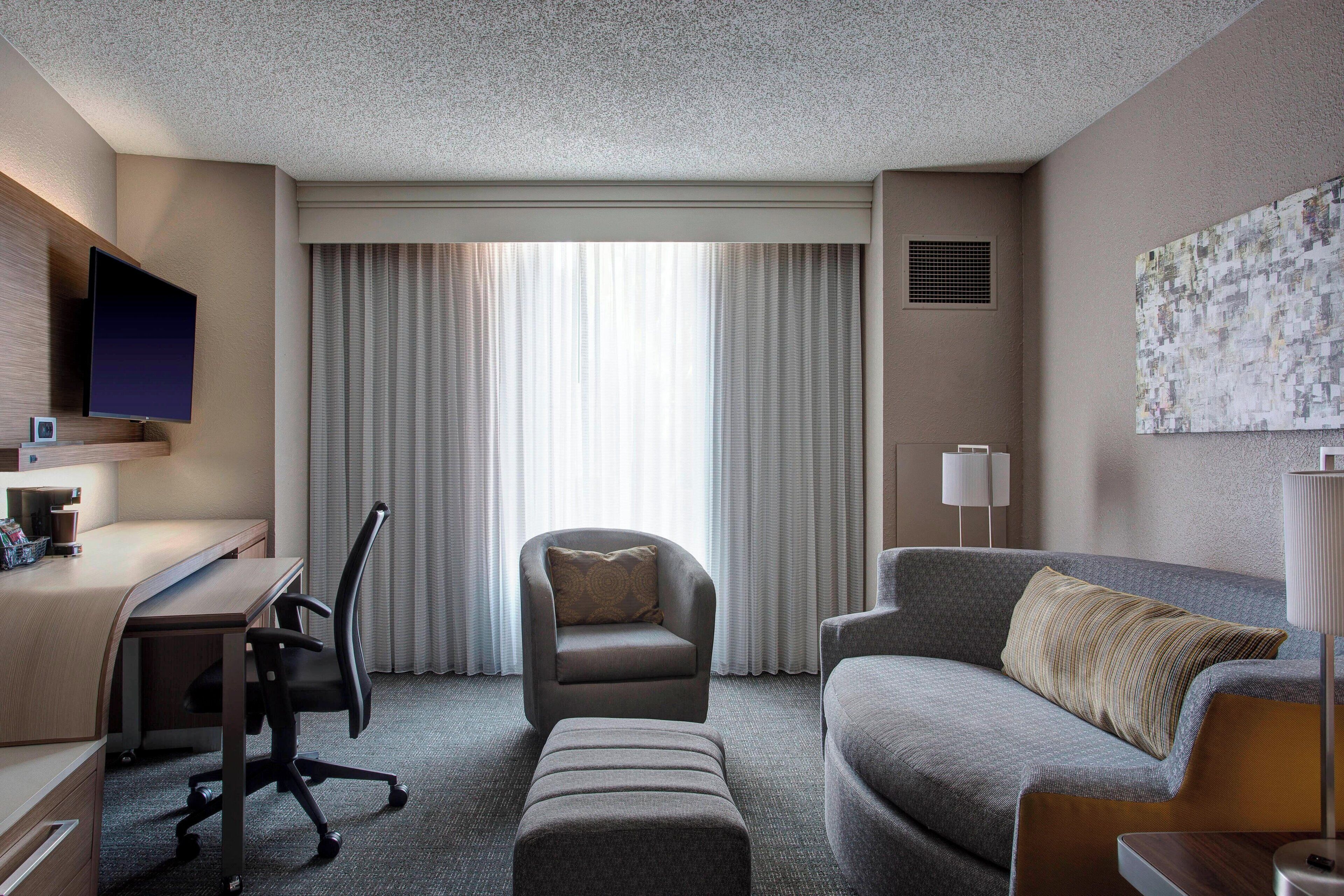 suite, 1 bedroom | living area | 26-inch flat-screen tv with cable channels, tv, pay films