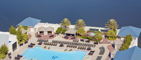 Seasonal outdoor pool, open 10:00 AM to 7:00 PM, cabanas (surcharge)