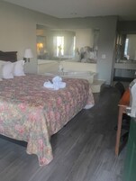 Tabla de planchar con plancha, wifi gratis, ropa de cama y despertador 