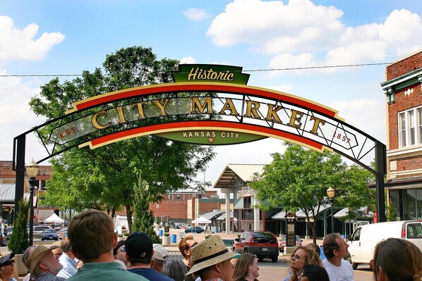 A historic city market sign with the text "Historic City Market Kansas City" and "1858".