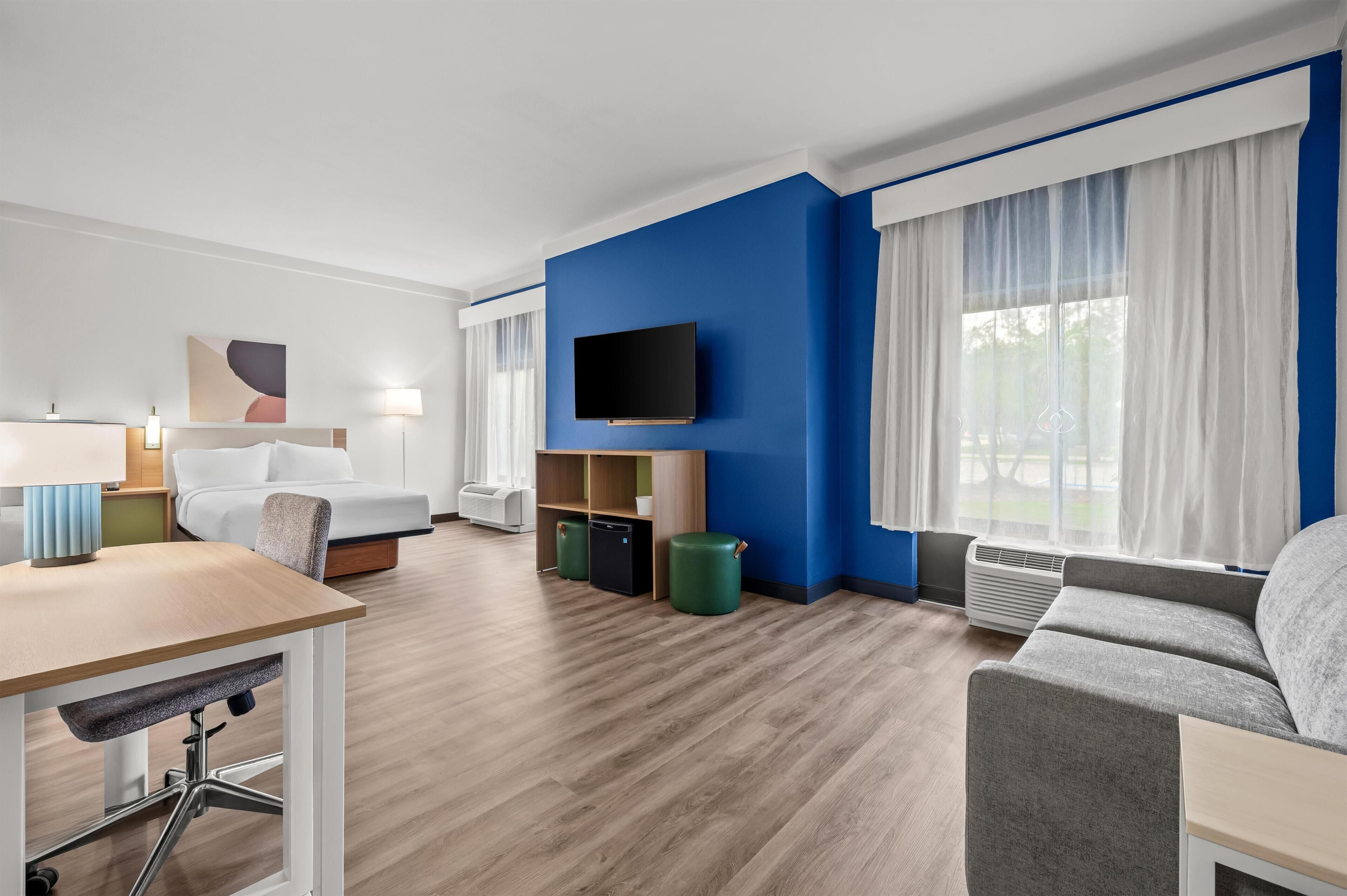 Room, 2 Queen Beds, Mobility Accessible (Roll-In Shower) | Desk, laptop workspace, iron/ironing board, WiFi (free)