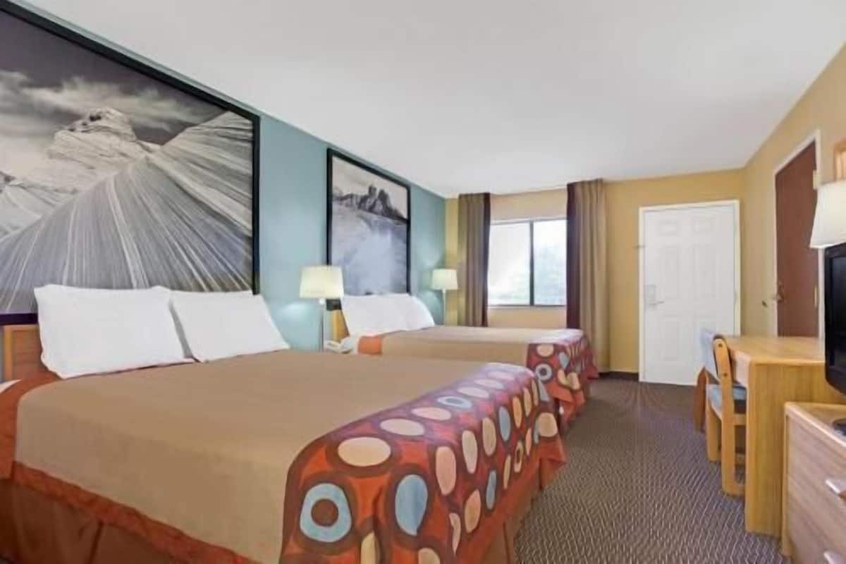 Individually furnished, desk, laptop workspace, blackout curtains