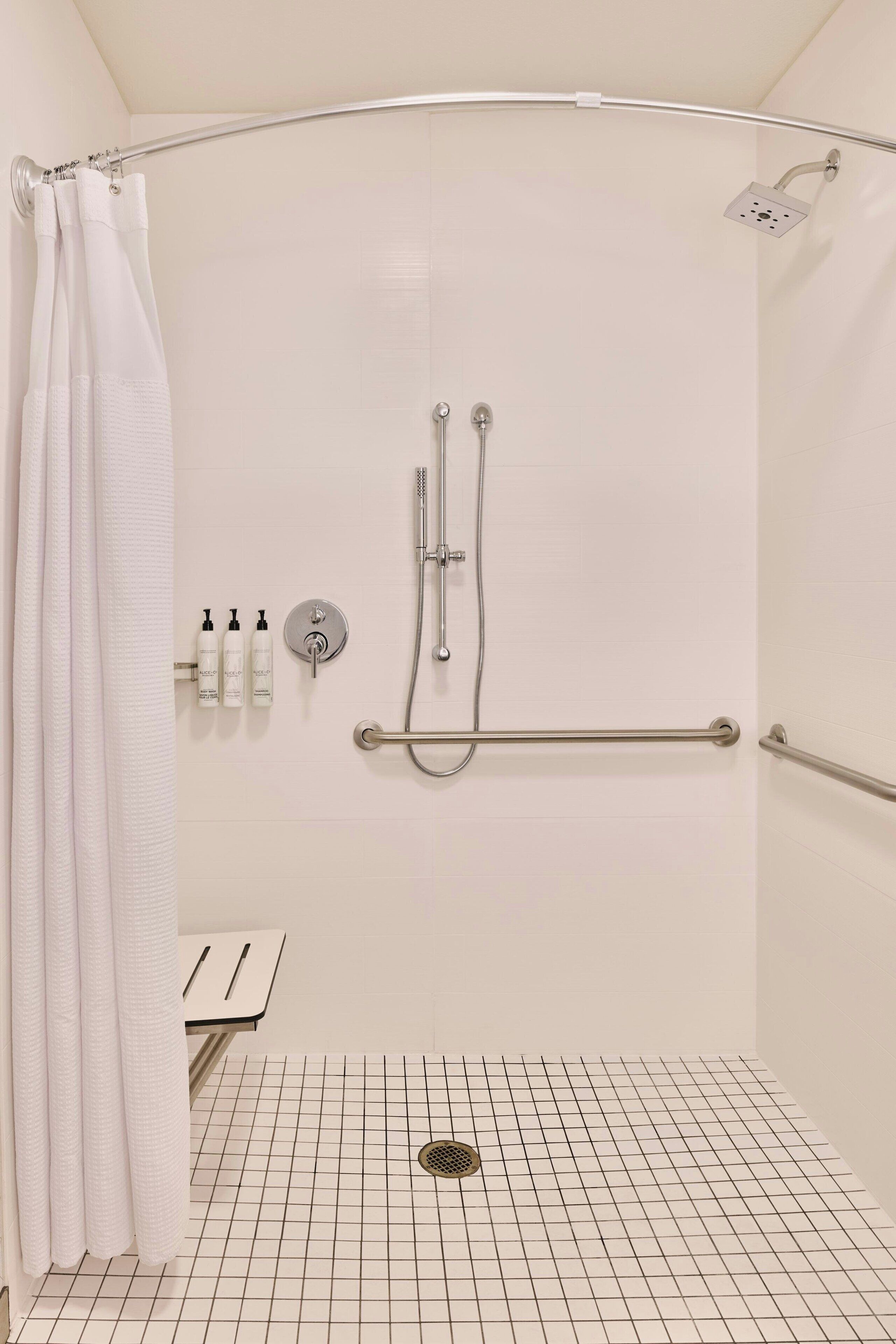 Combined shower/tub, hair dryer