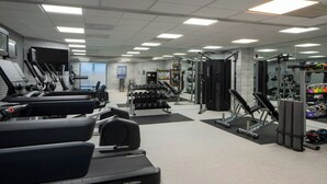 A gym with treadmills, dumbbells, and weight machines. - Fairfield Inn & Suites Atlanta Airport South/Sullivan Road (College Park)