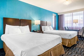 Premium bedding, desk, blackout drapes, iron/ironing board at Quality Inn and Conference Center Tampa-Brandon