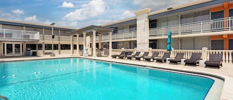 Outdoor pool, open 8:00 AM to 9:00 PM, pool umbrellas, pool loungers