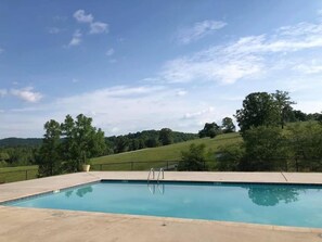 Seasonal outdoor pool, open 7:00 AM to 10:00 PM, pool umbrellas