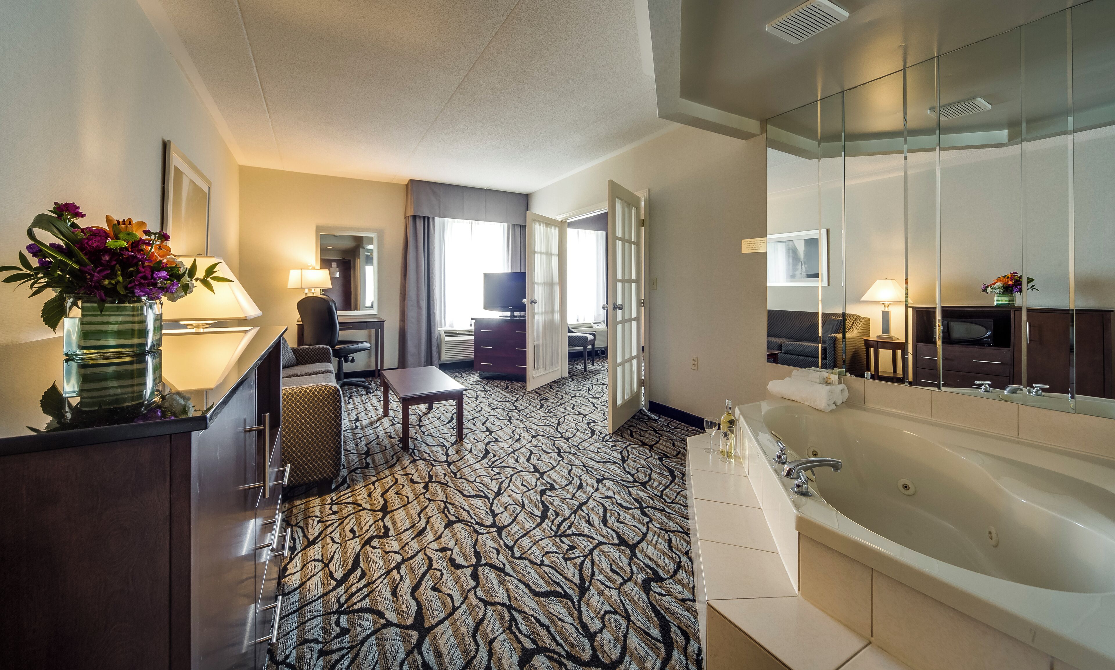 Deluxe King Suite with Jetted Tub-Separate Living Room | In-room safe, desk, laptop workspace, blackout drapes